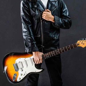 Play the guitar. Live music. Music festival. Instrument on stage, band. Electric guitar, guitarist, musician rock. Musical instrument Guitars strings. Music concept. Guitar acoustic